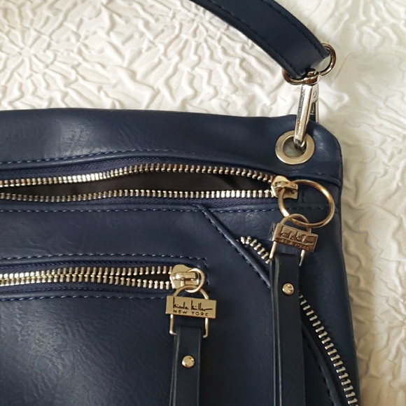Nicole Miller Navy Faux Leather Crossbody Bag with adjustable strap. 11" x 8" - Picture 12 of 16